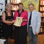 Grand Bard presenting award to Helen Doe and Alston Kennerley